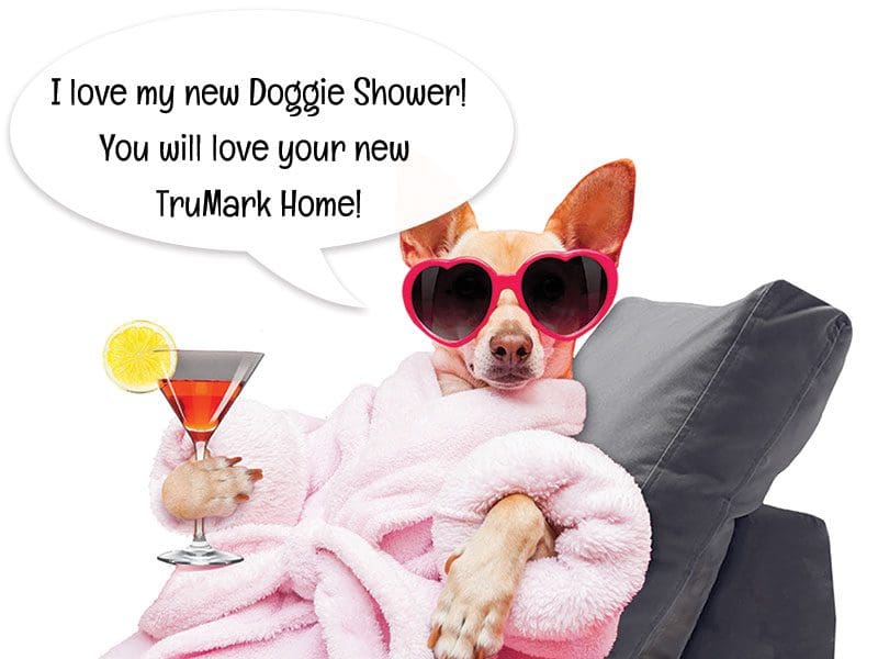 TruMark-Homes-Doggie-Shower Image of a dog in heart shaped sun glasses, pink robe, and holding a drink.